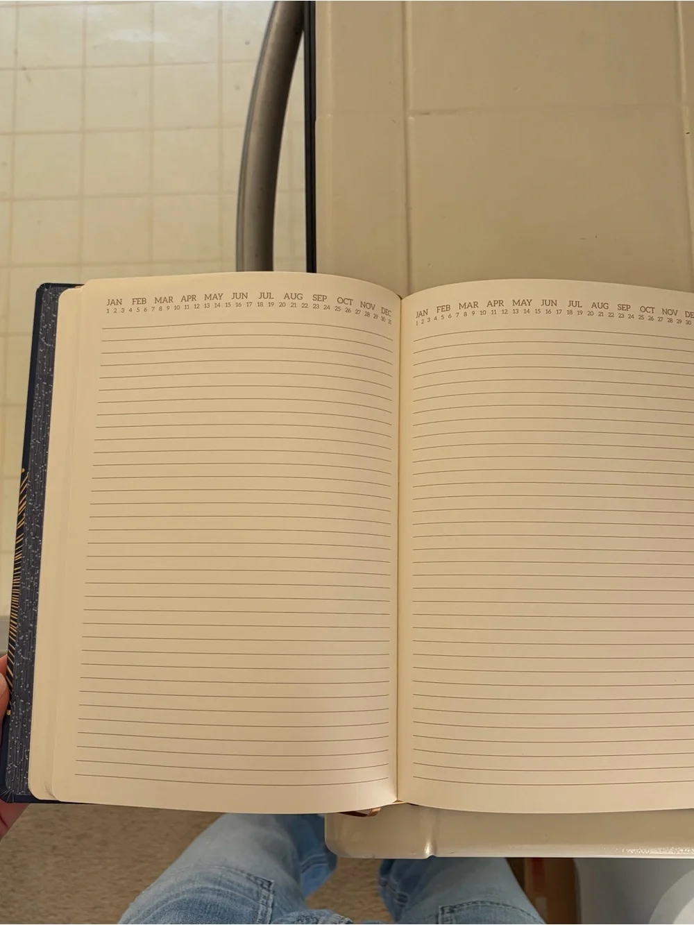 Navy Blue Notebook with Gold Burst Design
